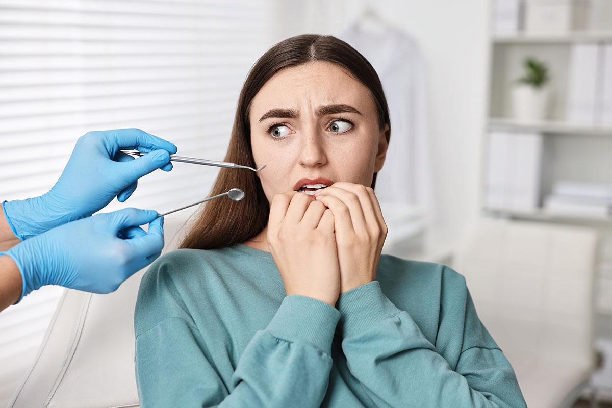 Woman fearful of going to the dentist